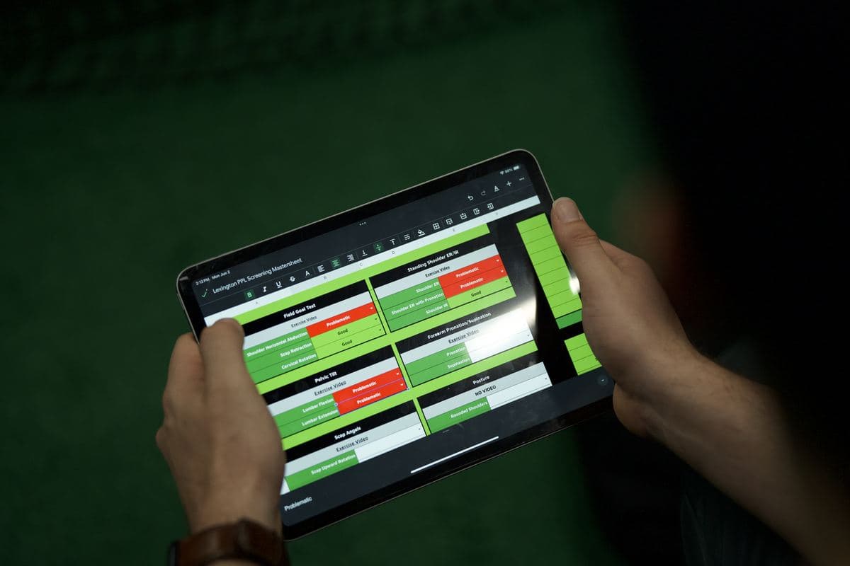 An athlete reviewing their numbers in the PPL app